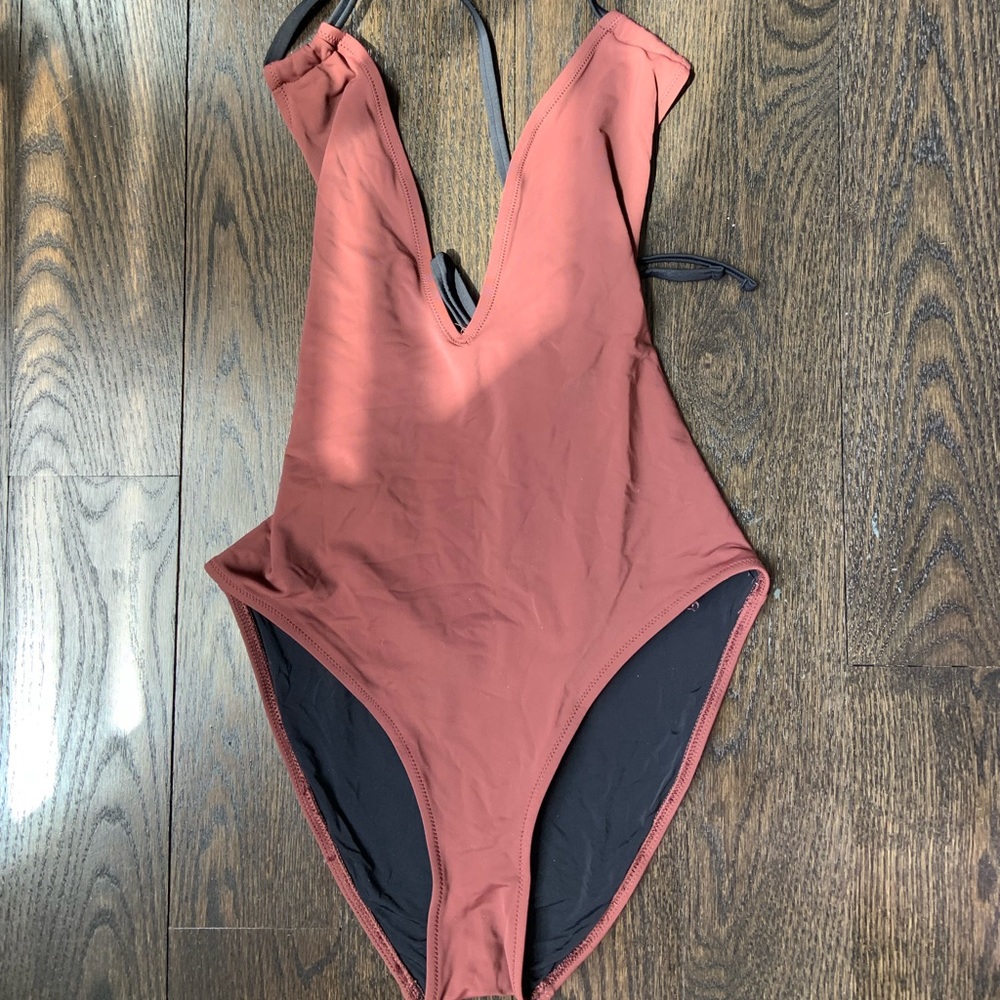 Solid and striped one piece.